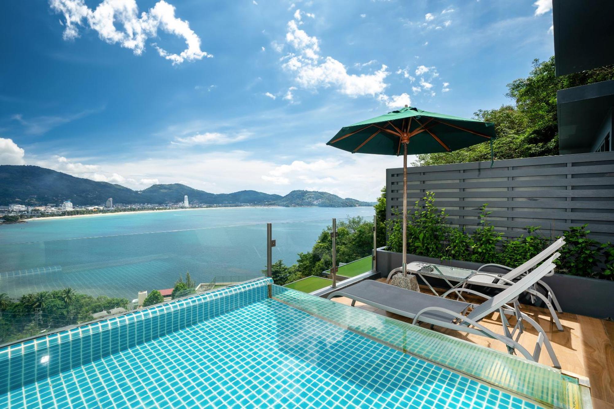 Indochine Resort And Villas - Sha Extra Plus Patong Extérieur photo View of the Andaman Sea from the pool of a villa at the resort