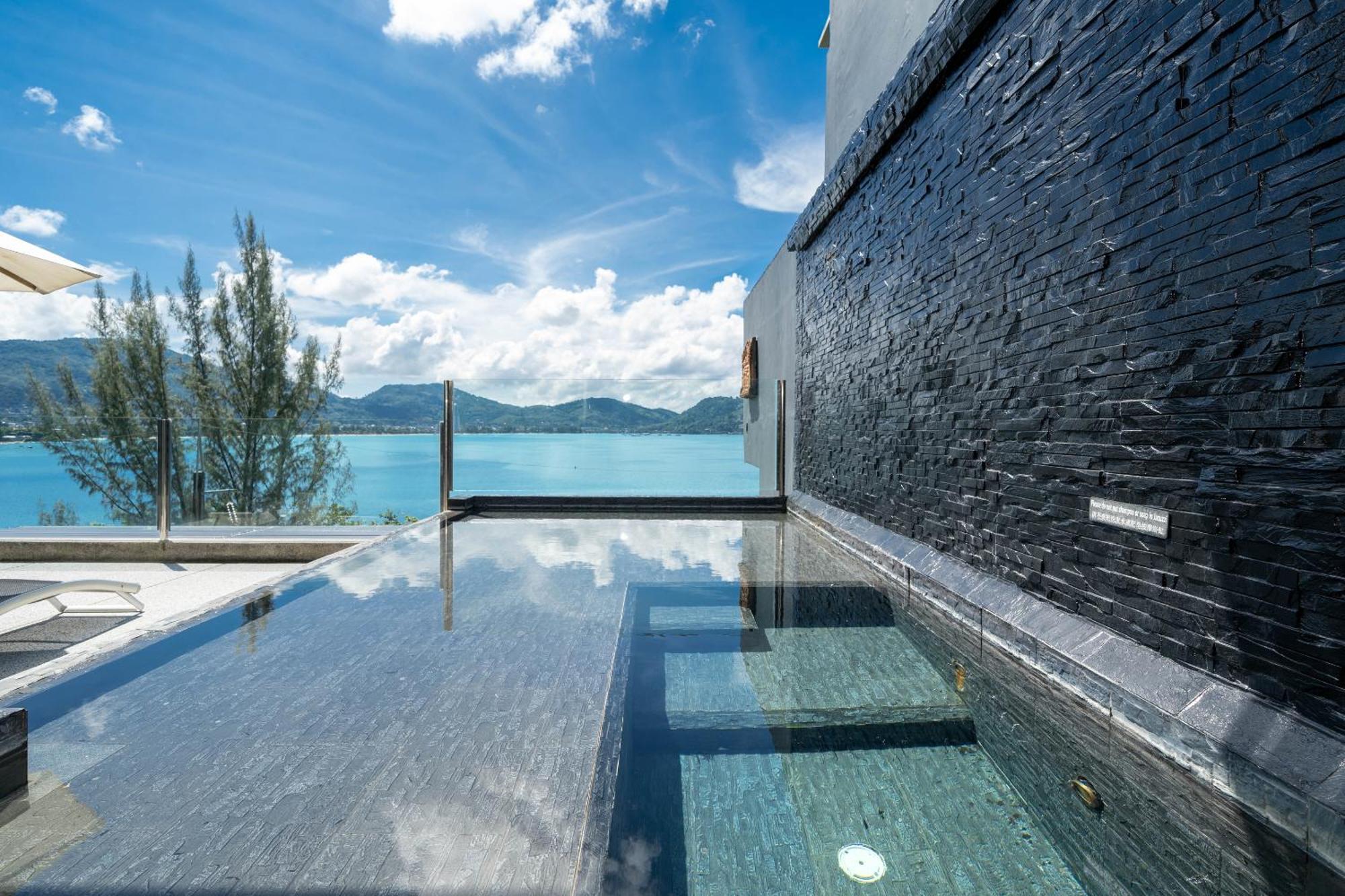 Indochine Resort And Villas - Sha Extra Plus Patong Extérieur photo The swimming pool at the hotel