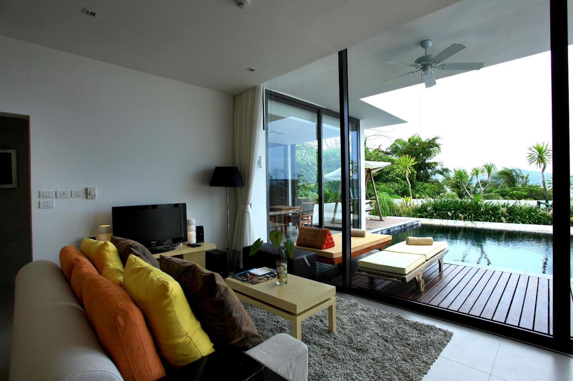 Indochine Resort And Villas - Sha Extra Plus Patong Extérieur photo A living room with a view of the pool
