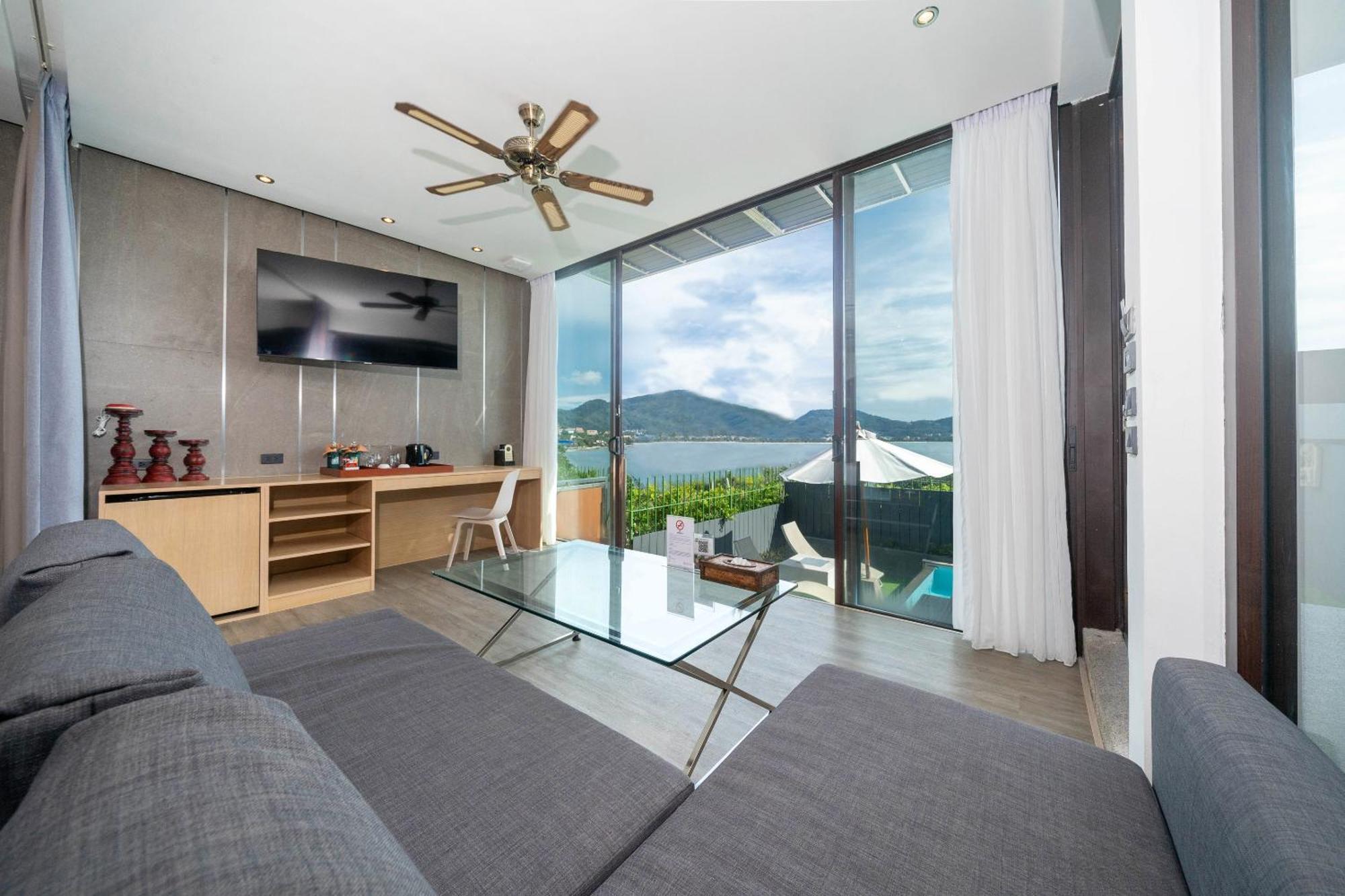 Indochine Resort And Villas - Sha Extra Plus Patong Extérieur photo A living room at the hotel